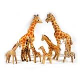 (8pc) STEIFF GIRAFFES | Three with tag and/or button - l. 12 x w. 4 x h. 19 in. (largest)