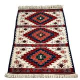 ANATOLIAN WOOL KILIM RUG | Having three medallions on a cream ground. - l. 60 x w. 40 in 