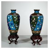 PAIR CHAMPLEVE ENAMEL VASES | Each decorated with colorful reserves of butterflies and flowers. - h.