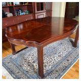 WINTERTHUR SHAPED TOP DINING TABLE | With center fields of reverse diamond matched flaming swirl-off