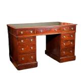 ENGLISH MAHOGANY PEDESTAL WRITING DESK | Oblong top with gilt-tooled green leather writing surface a