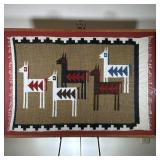 FRAMED ALPACA WEAVING | Showing five alpacas on beige background with black and white border. - w. 4