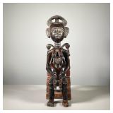 AFRICAN CARVED WOOD MATERNITY FIGURE | l. 6 x w. 7 x h. 18.5 in 