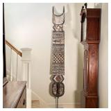 LARGE AFRICAN WOOD CARVING | Large African wood carving on metal stand showing various patterns, car