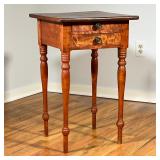 FEDERAL MIXED WOOD WORK TABLE | Flame mahogany top side table over 2 full-width drawers on ring turn
