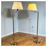 PAIR ADJUSTABLE ARM FLOOR LAMPS | Brass bases with double articulated arms. - h. 54 x dia. 14 in (ov