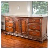 BASSETT FURNITURE DRESSER | Long dresser with two banks of three drawers centering cabinet doors bef