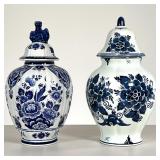 (2PC) DELFT JARS | Two lidded jars, one with a lion form finial. - h. 10.75 x dia. 6 in 