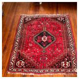 SMALL PATTERNED RUG | Area rug with center medallion on a red ground. - l. 65 x w. 48 in 