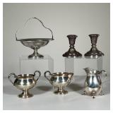 (6PC) MISC. STERLING SET | Including two candlesticks, a chalice, two pitchers, and a handled dish. 