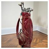LEATHER GOLF BAG & CLUBS | Including; red leather golf bag with bright yellow stitching, Thoroughbre