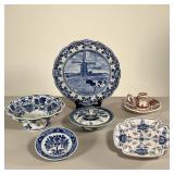 (6PC) MISCELLANEOUS DELFT | Including a red and gilt chamber stick, a decorative plate, a pedestal b