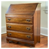 SLANT TOP DESK | Secretary desk with a drop front writing surface over three drawers. - l. 32 x w. 1