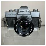 MINOLTA SR-T 102 CAMERA LOT | A Minolta SR-T 102 35mm Camera with original box, all manuals, lens ca