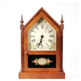 SETH THOMAS SHELF CLOCK | Electric movement, eglomise panel. - l. 5 x w. 9 x h. 14 in 