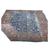 OVERALL PATTERN CARPET | Floral overall pattern on a blue ground within a red border, cut and rearra