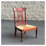 A.H. DAVENPORT SLIPPER CHAIR | Finely carved splat and turned supports, rush seat. - l. 20 x w. 20 x