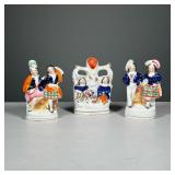 (3PC) STAFFORDSHIRE FIGURAL GROUPS | Including two figures of pairs of girls engaged in various acti