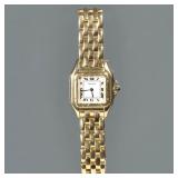  A LADIES PANTHERE DE CARTIER 18K GOLD WRISTWATCH | White dial with Roman numerals, stylized