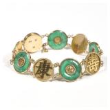 JADE & 18K GOLD CHINESE BRACELET | With alternating links of gold Chinese characters and gold mounte
