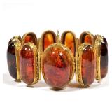 ANTIQUE AMBER TOURMALINE LINK BRACELET | Having ten well-matched links of oval amber tourmaline cabo
