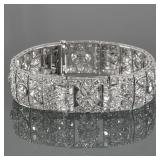 FRENCH ART DECO DIAMOND BRACELET | Style of Cartier; designed as articulating rectangular filigree l