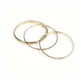 (3pc) 14K GOLD BRACELETS | Including a Hollow smooth gold bracelet, (10.9g), a twisted rope form bra