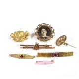 (7pc) ANTIQUE 14K GOLD PINS | a 1908 bar pin with amethyst cabochon, an art nouveau pin with a portr