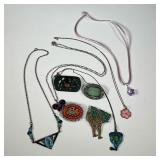 ENAMELED STERLING JEWELRY | Including a sterling and ancient Roman glass pin and a micromosaic pin; 