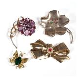 (4pc) STERLING BROOCHES | Vermeil / gold-tone sterling silver fashion pins, including two flower pin