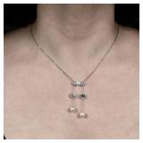 J.E. CALDWELL NATURAL PEARL & DIAMOND NECKLACE | Designed as central plaque mounting a natural butto