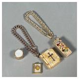 (4PC) VINTAGE PENDANTS & CHARMS | Interesting charms/jewelry, including a book-form locket box on a 