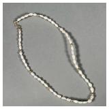 PEARL & 14K NECKLACE | Baroque pearl and 14k yellow gold beaded necklace, marked 14K on the clasp in