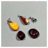 (4PC) AMBER PENDANTS | Including two butterscotch amber pendants with sterling silver leaf-form moun