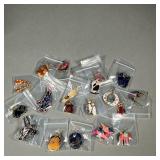 ASSORTED CAT EARRINGS | Various cat earrings made of metal & enamel, painted wood, and plastic.