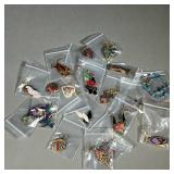 COLLECTION OF ENAMELED EARRINGS | Colorful enamel earrings depicting nature and animals.