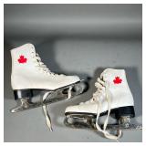WOMEN’S WHITE CANADIAN ICE SKATES | Size 7 women’s white ice skates with Canadian maple leaf in ankl