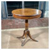 DRUM SIDE TABLE | Having burl wood veneer top over turned wood pedestal base with brass claw feet. -