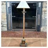 PEDESTAL FLOOR LAMP | Carved wood standing lamp with fluted column and brass leaves on top with pede