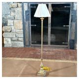 BRASS STANDING LAMP | Having fluted neck over square base. - l. 7 x w. 7 x h. 57.5 in