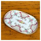 FLORAL & GILT LIMOGES PLATTER | Limoges oval platter with painted floral and gilt decoration. - l. 1