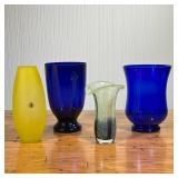 (4PC) COLORED GLASS VASES | Including: 2 cobalt glass vases, colorful art glass vase with purple and