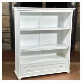 WHITE SHELVING UNIT | There are 4 shelves, one shelf is double stacked. The bottom drawer is operati