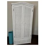 WHITE PAINTED WICKER CABINET | Having double doors over a single drawer with a domed top.