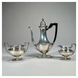 (3PC) WALLACE STERLING SILVER COFFEE SET | Comprising a coffee pot with an ebonized wood handle, an 