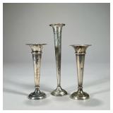 (3PC) STERLING BUD VASES | Three sterling silver bid vases with weighted buttons h closing a pair wi