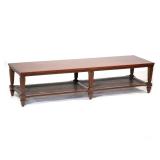 WOOD & CANE COFFEE TABLE | Long rectangular coffee table with carved wood legs and caned & paneled l