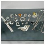 STERLING & OTHER JEWELRY | Several sterling silver pieces, each stamped, including: two flat woven n