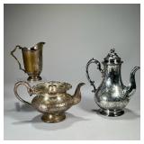 (3PC) SILVER PLATE ITEMS | Including an engraved coffee pot with fruit finial, an engraved teapot, a