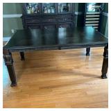 Ashley Furniture DR Table | Striking dining room table with a mahogany finish in the Ledelle Series 